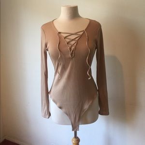 Forever 21 tan lace up body suit NWT