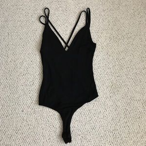 Black cross back body suit