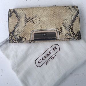 Snakeskin coach wallet