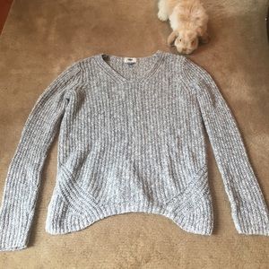 Gray sweater. Please excuse my super cute bunny