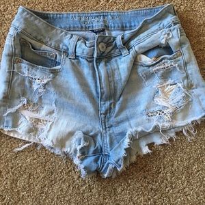 distressed light wash jean high waisted shorts
