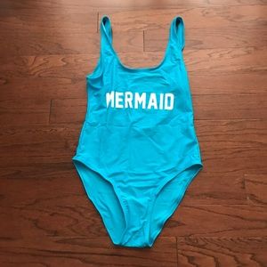 Low back high leg one piece swimsuit *NEVER WORN*