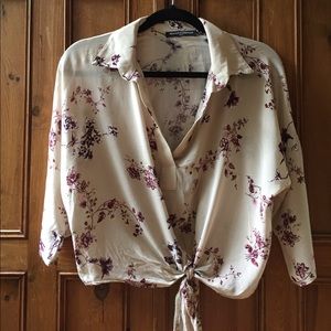 Floral, loose tie shirt.