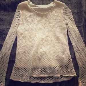 Long sleeve, sequin girls sweater.