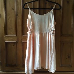 Peach flowy dress.
