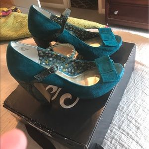 Teal suede pumps