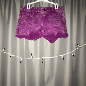 Distressed purple jean shorts