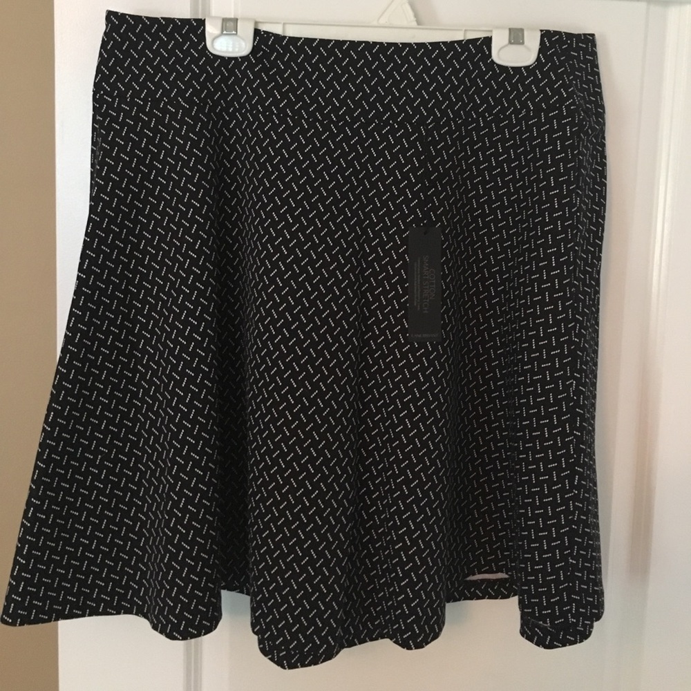 Never worn - black and white above knee skirt