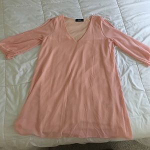 light pink dress with open cut arms