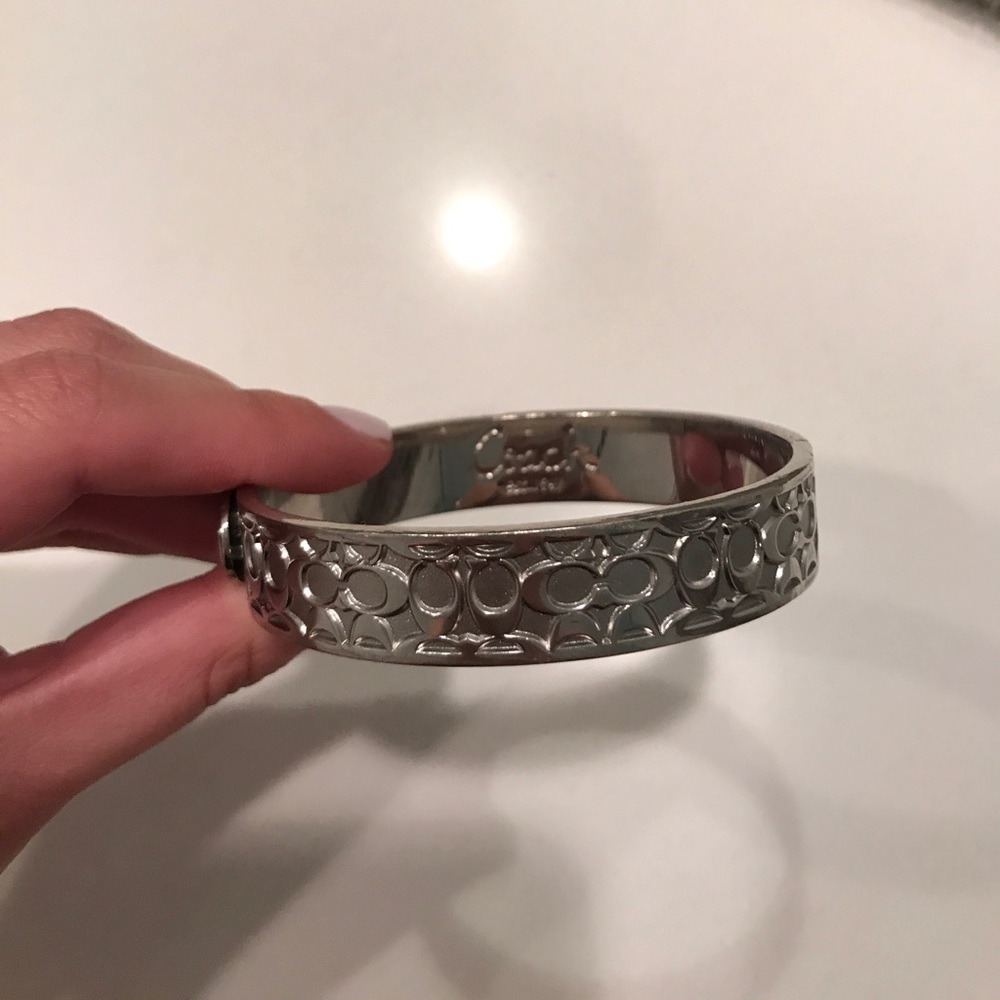Coach silver C's bangle.