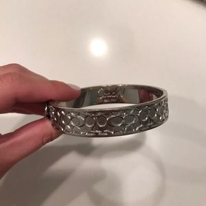 Coach silver C's bangle.