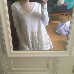 White ruffled bottom blouse