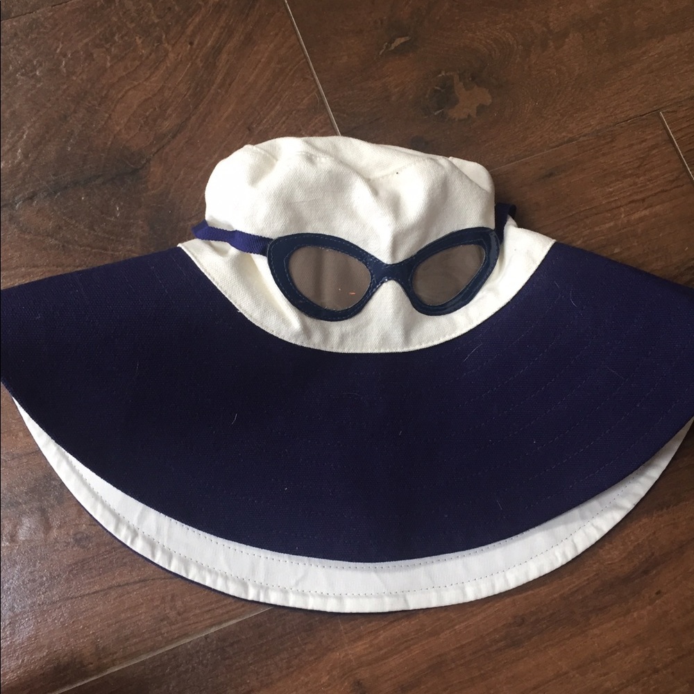 Kate Spade sun hat with sunglass embellishment.
