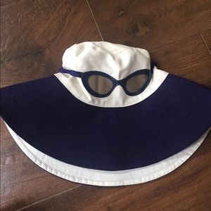 Kate Spade sun hat with sunglass embellishment.