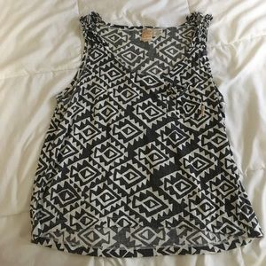 gray and white tank with pocket