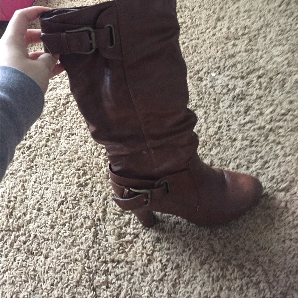 Brown knee height boots with heel