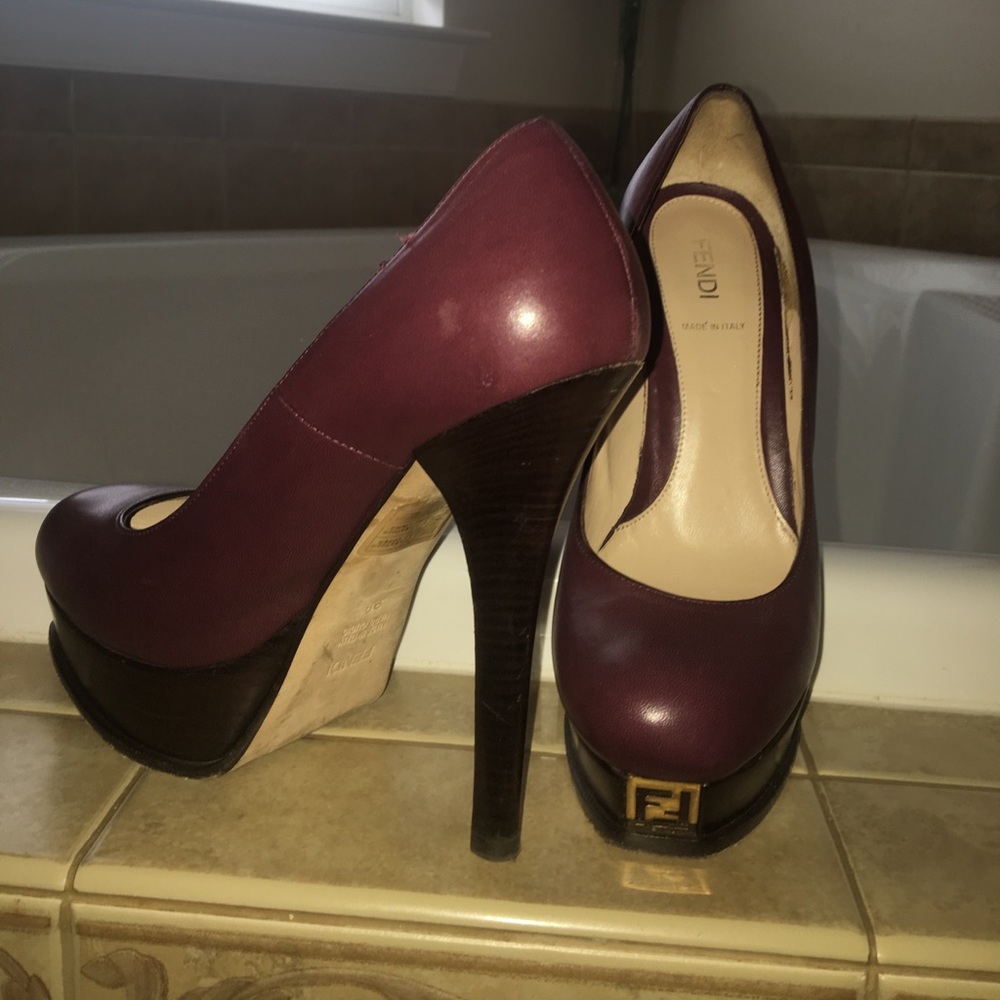Sold **Wine colored Fendi pumps**