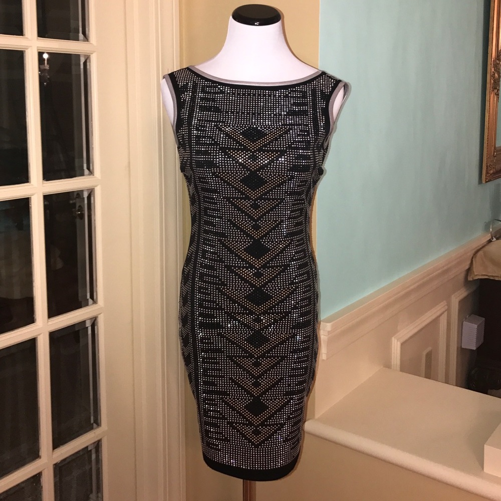Short fitted low back rhinestoned sleeveless dress