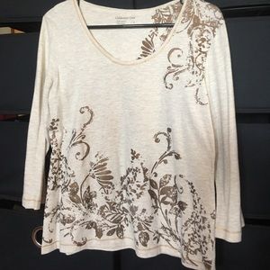 Beautiful blouse with brass colored design