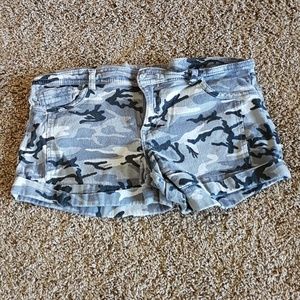 Miley Cyrus camo shorts