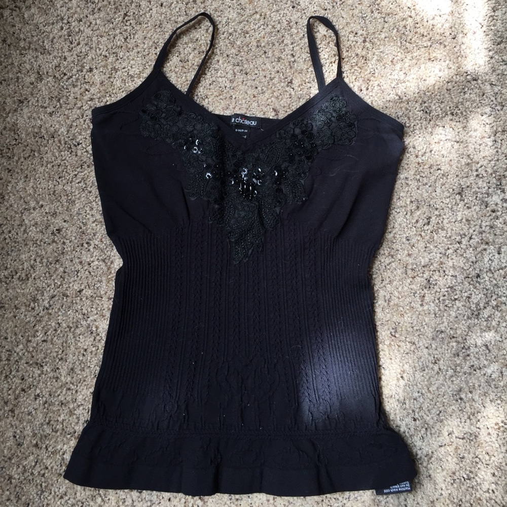 3 for $20 eligible! Black tank with jewel detail.