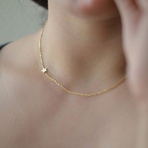 Dainty gold star necklace