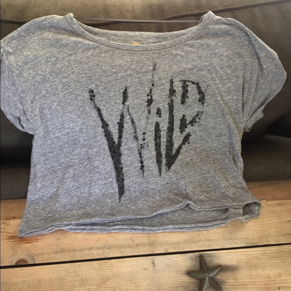 Grey tshirt with lettering spelling "Wild"