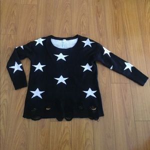 Distressed star sweater