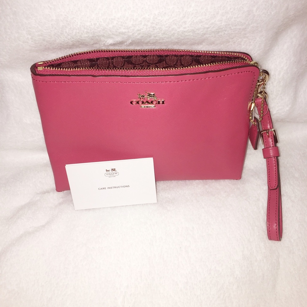 Authentic Coach Wristlet (coral in color) NWT