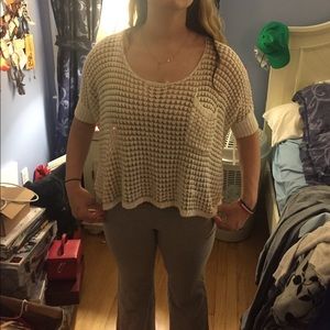 White and gold knit top