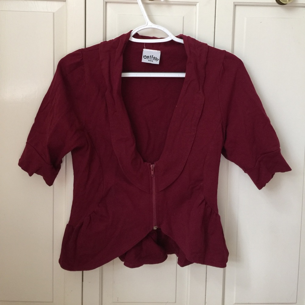 Red Peplum zip up. Good condition.
