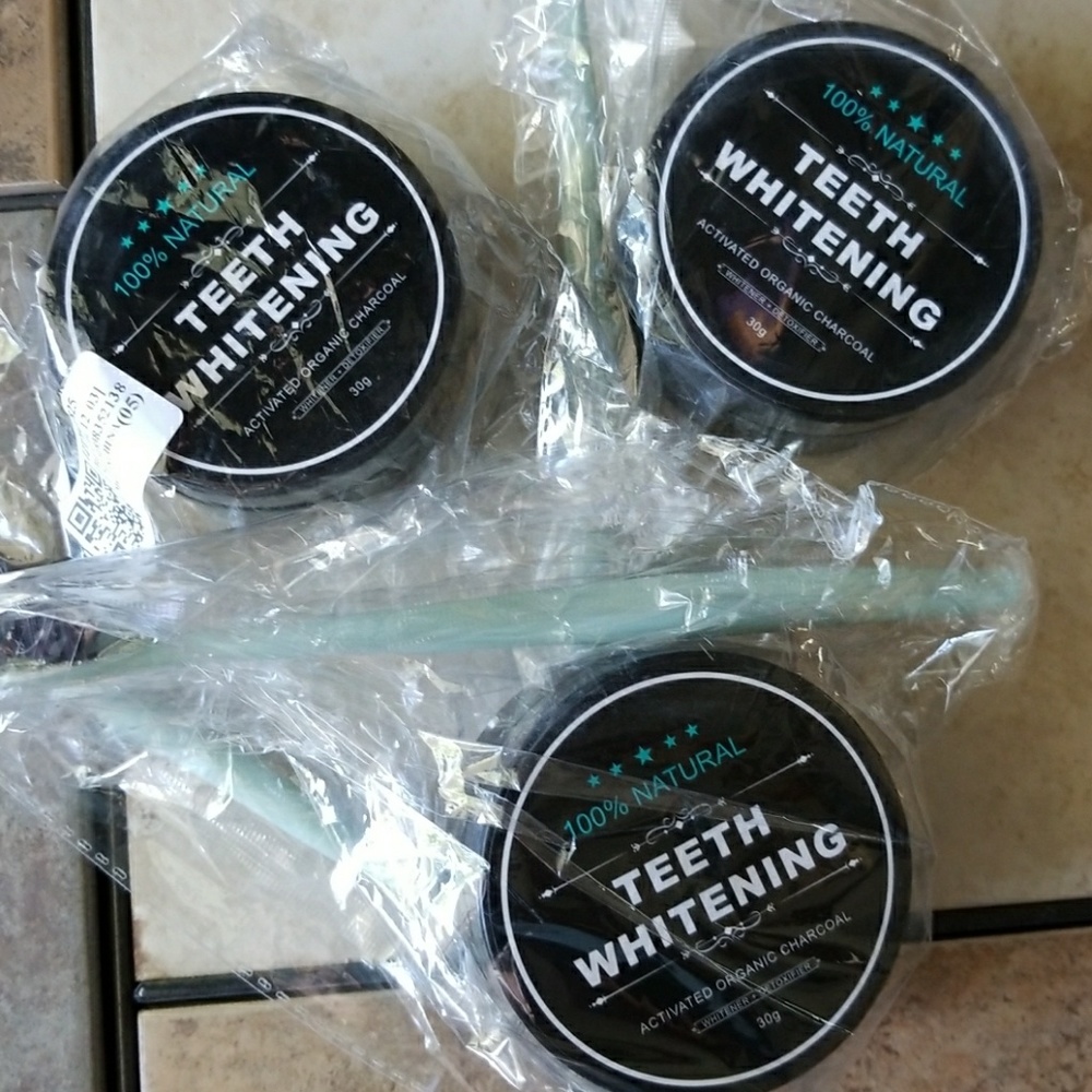 Activated organic charcoal with toothbrushes