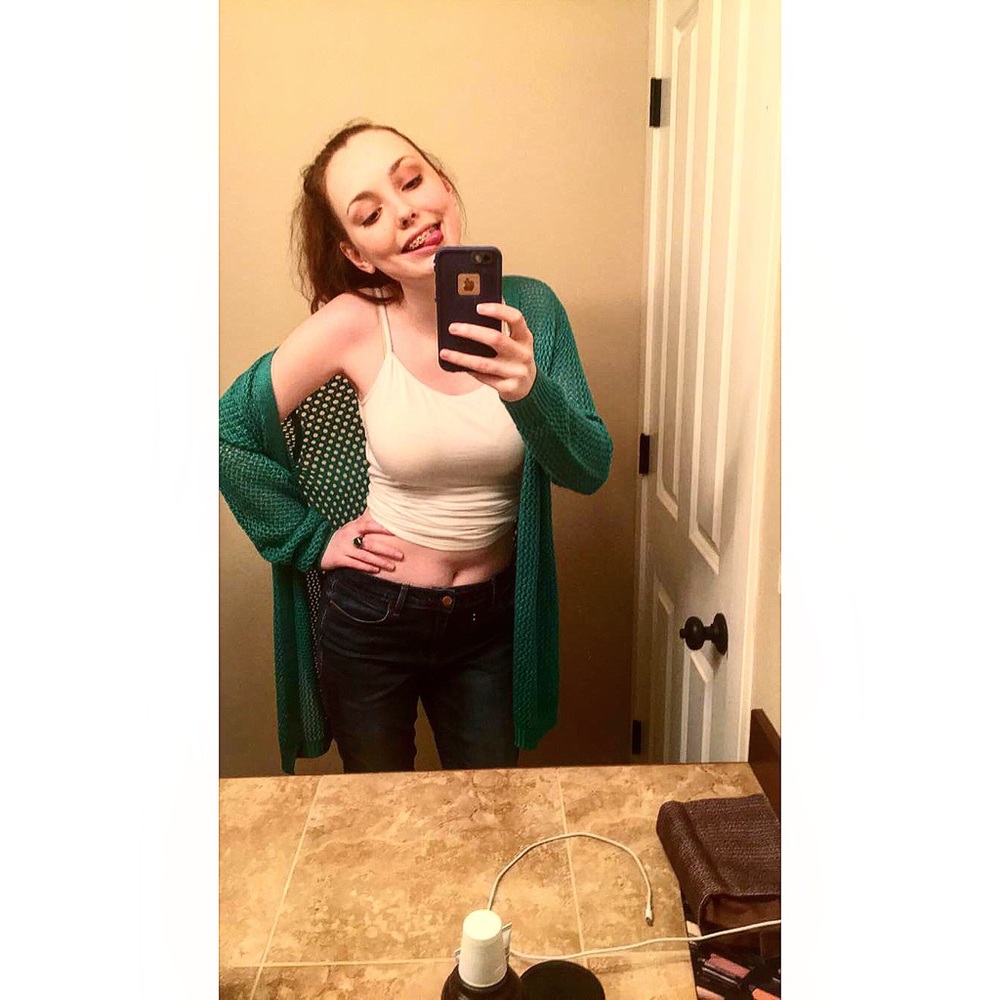 Knit turquoise cardigan only worn twice. Looks new