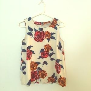 Fun floral sleeveless top with scalloped hem