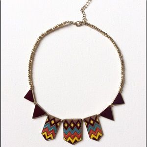 Festival gold tone geometric necklace