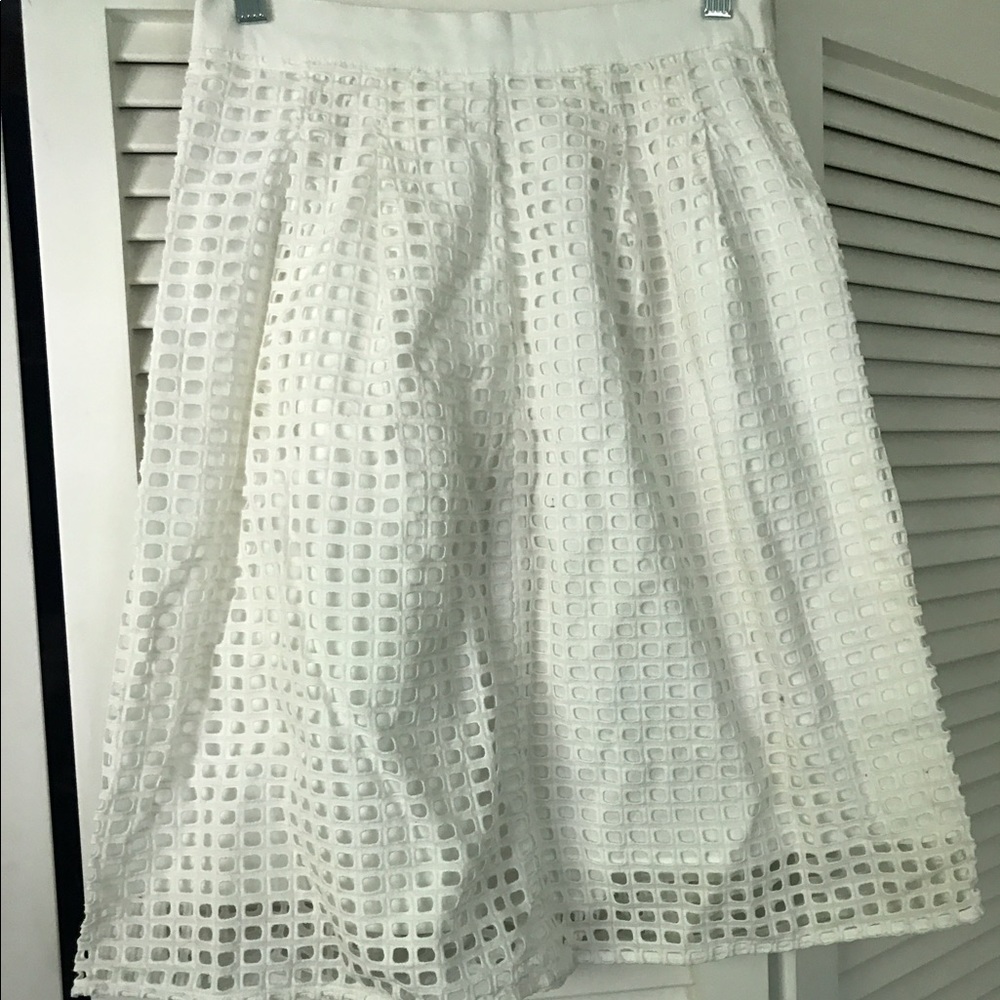 Tea length white skirt