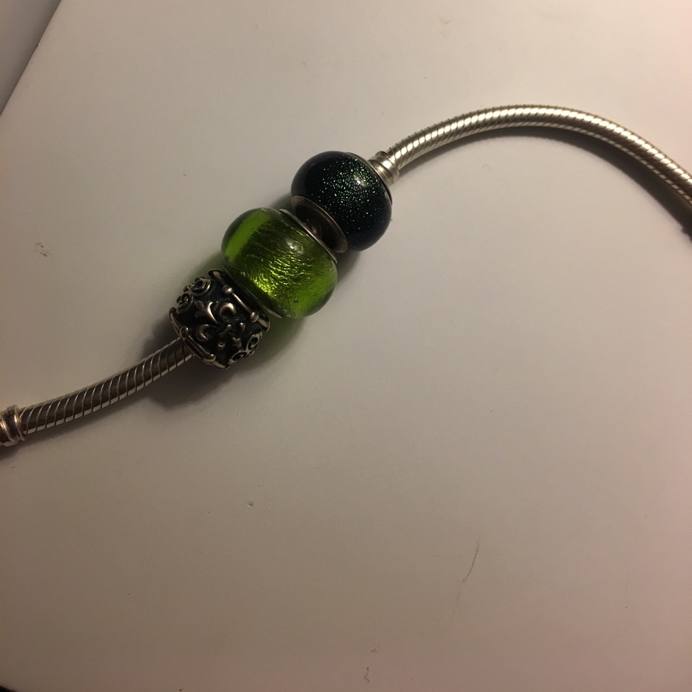 THREE PANDORA CHARMS