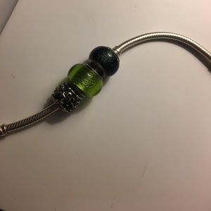 THREE PANDORA CHARMS