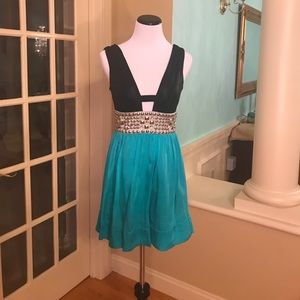 Bebe black and aqua low cut cocktail dress