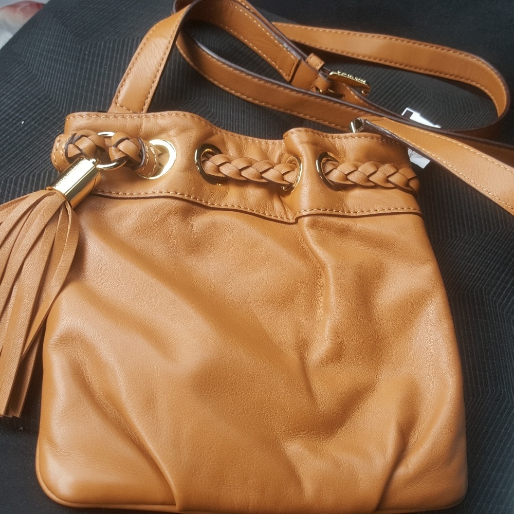 Tan Michael Kors crossbody bag.