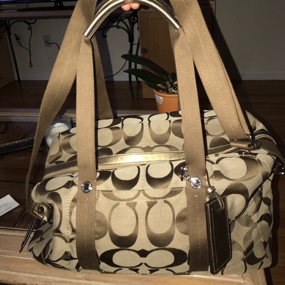 Coach voyager monogram duffle bag