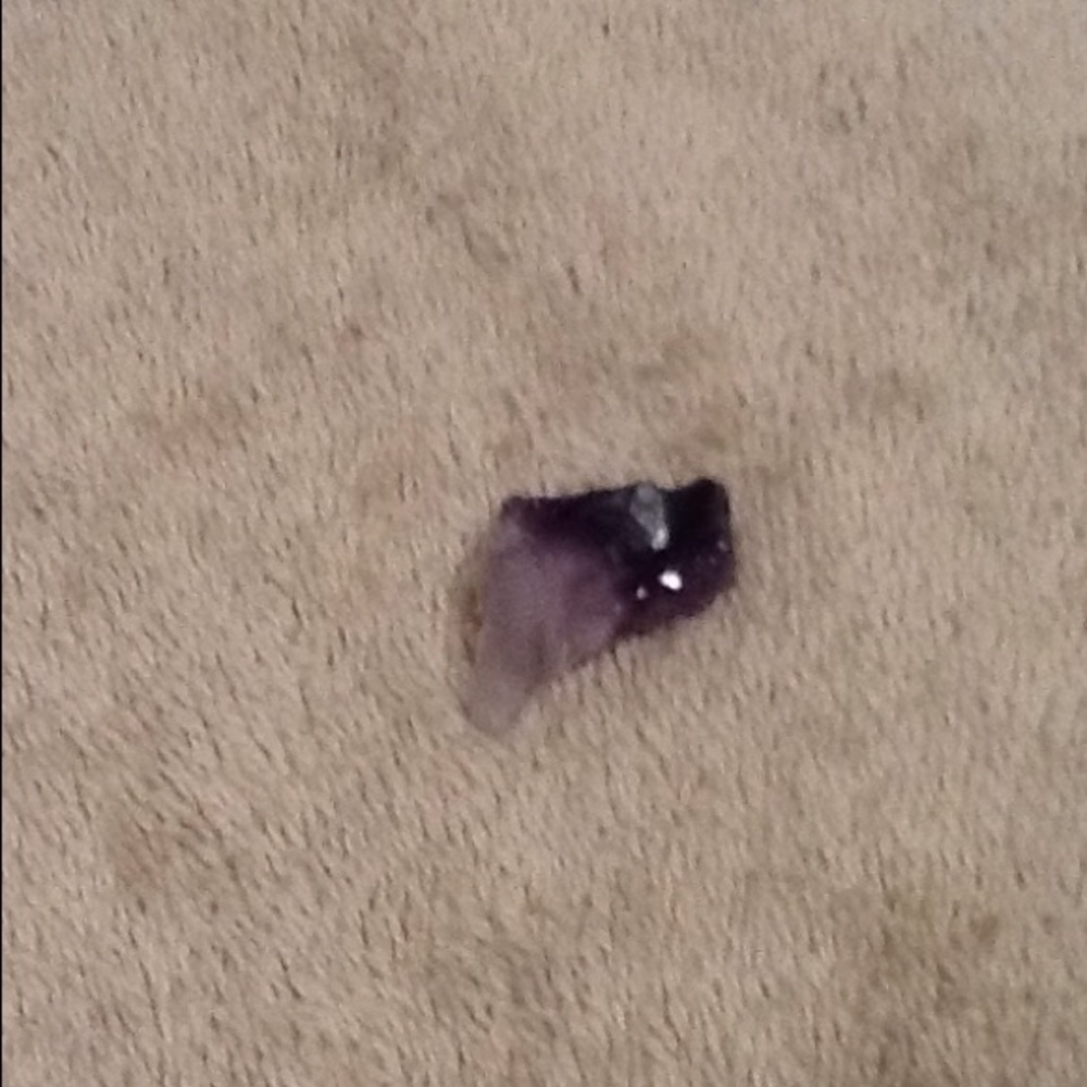 A purple and white crystal