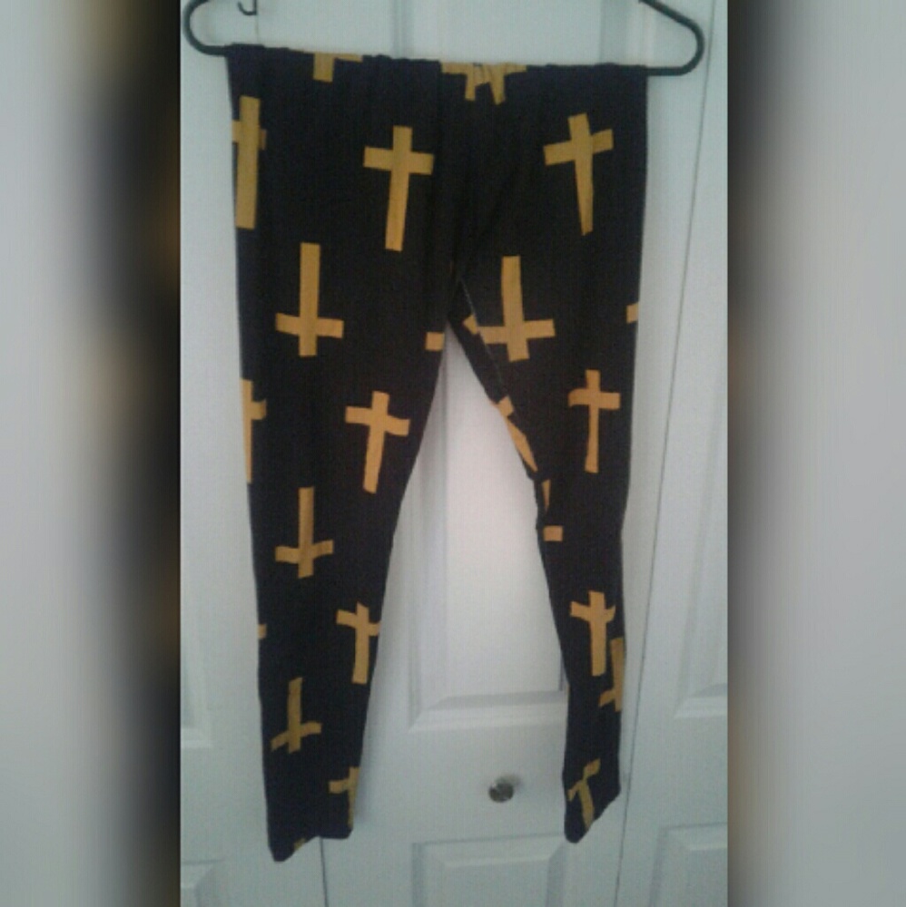 Dark navy blue leggings with yellow crosses