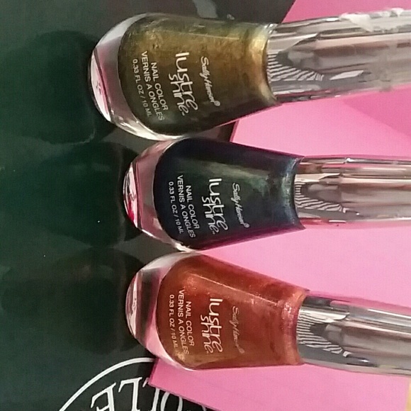 3 sally hansen nail polishes. I  haven't used any - Picture 1 of 4