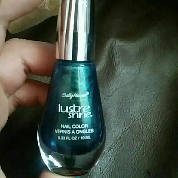 3 sally hansen nail polishes. I  haven't used any - Picture 2 of 4