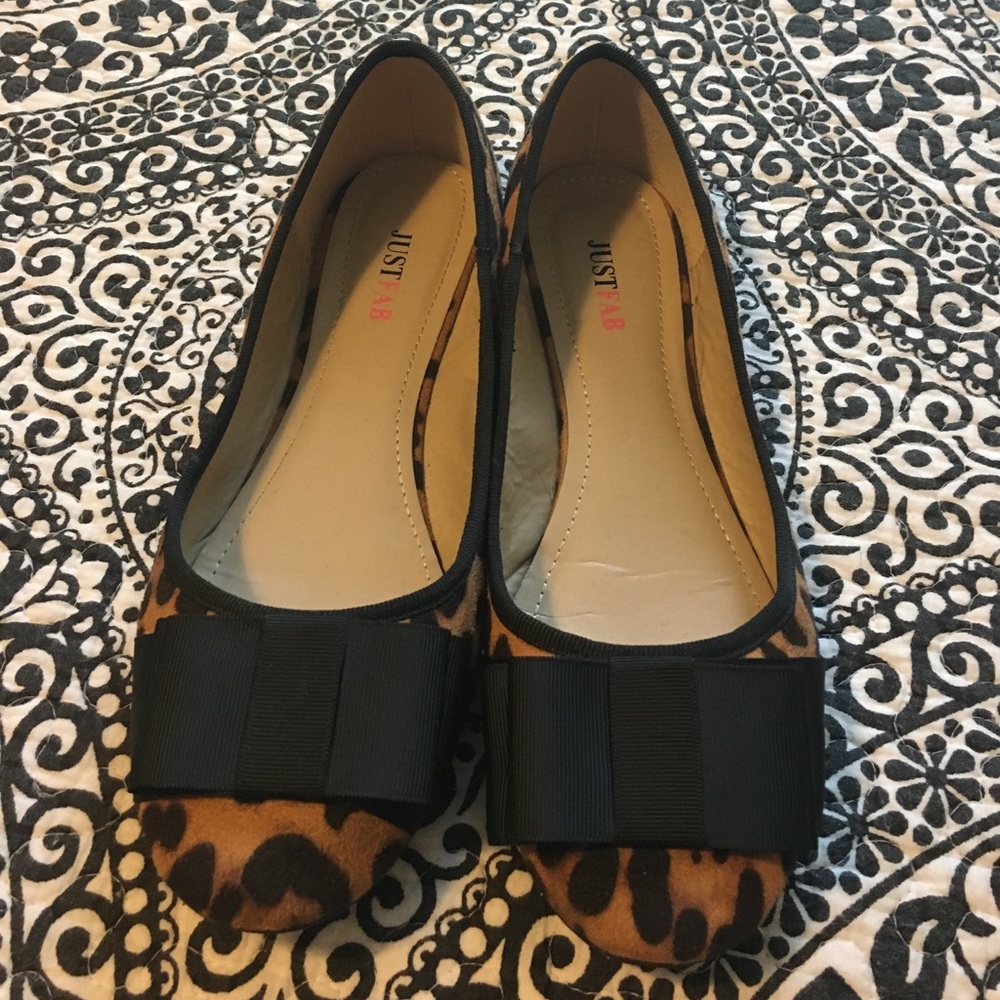 Animal print flats with bow detail