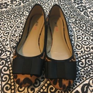 Animal print flats with bow detail
