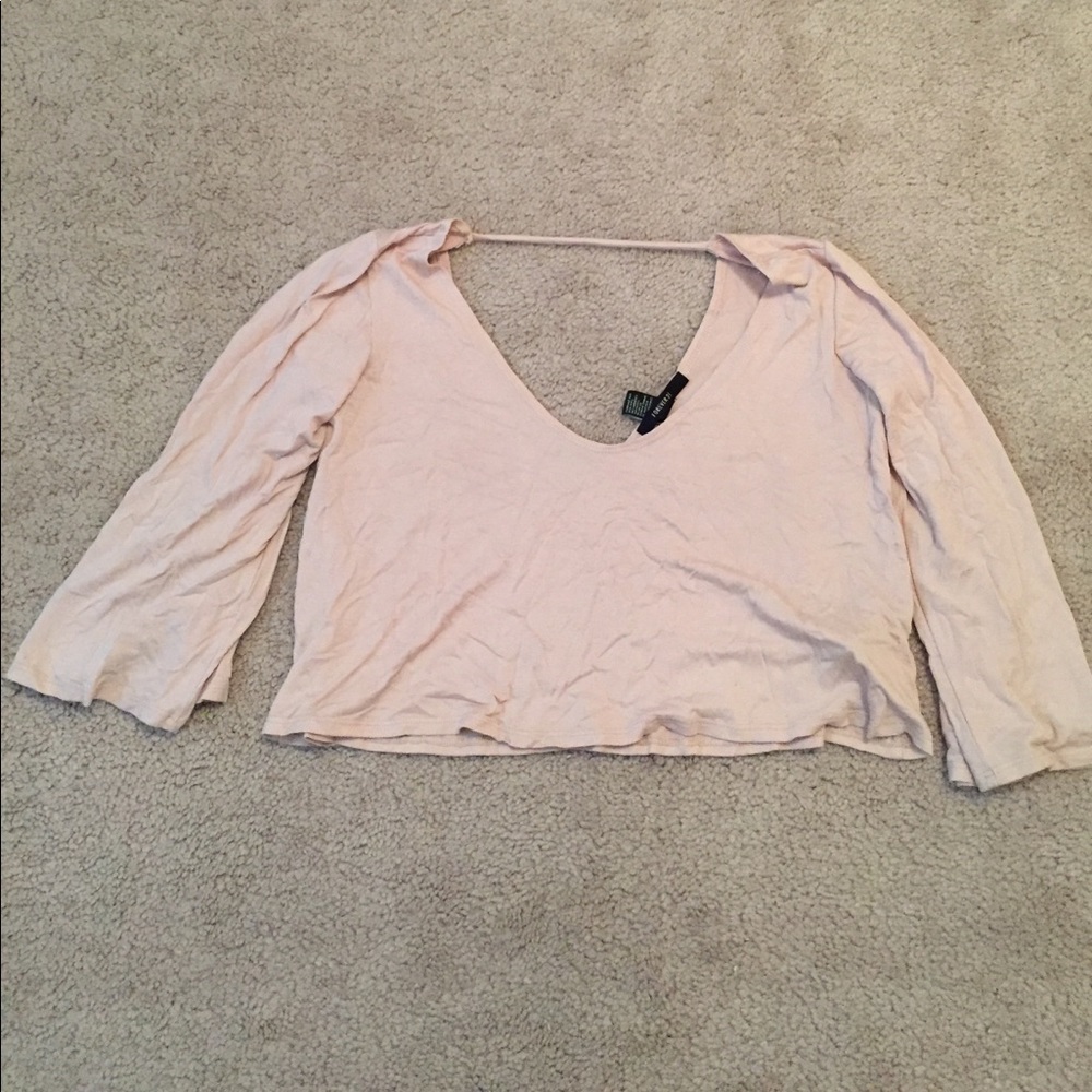 Tan quarter sleeve crop top.