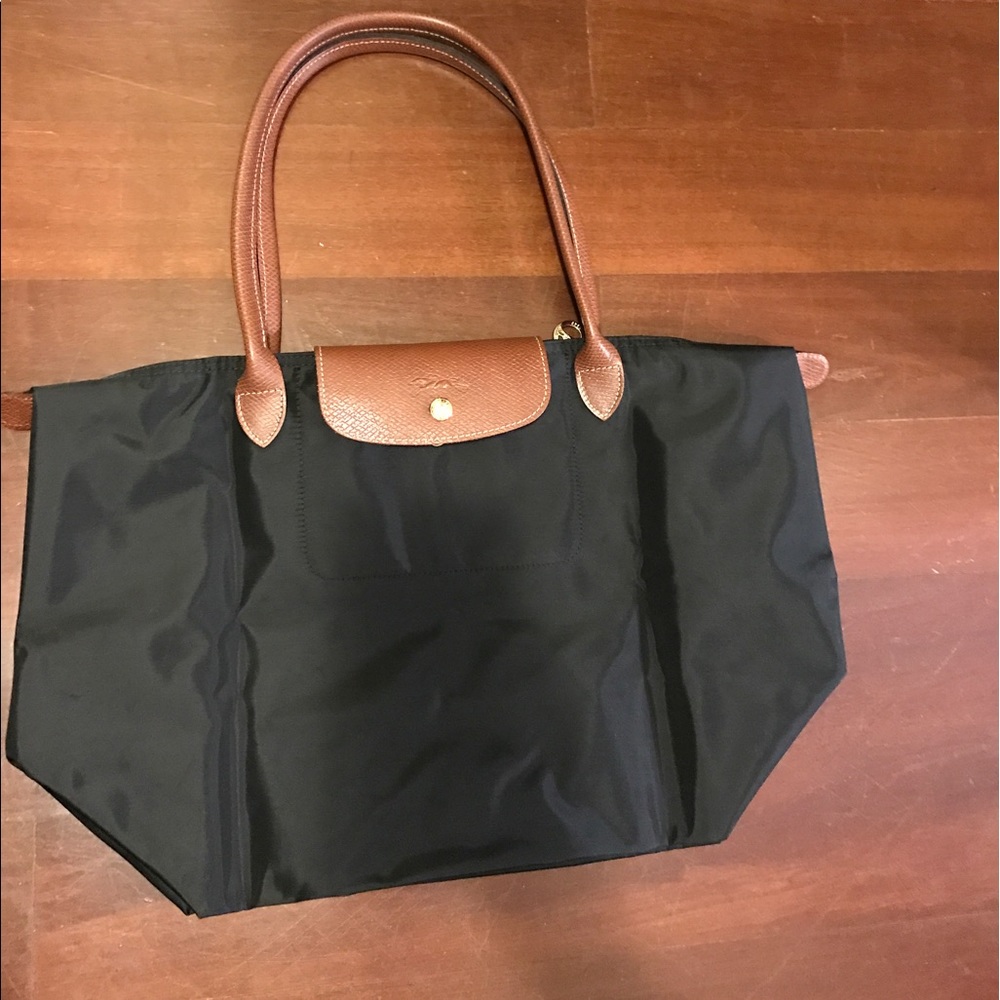 Medium long champ bag! Less than 6 months old!