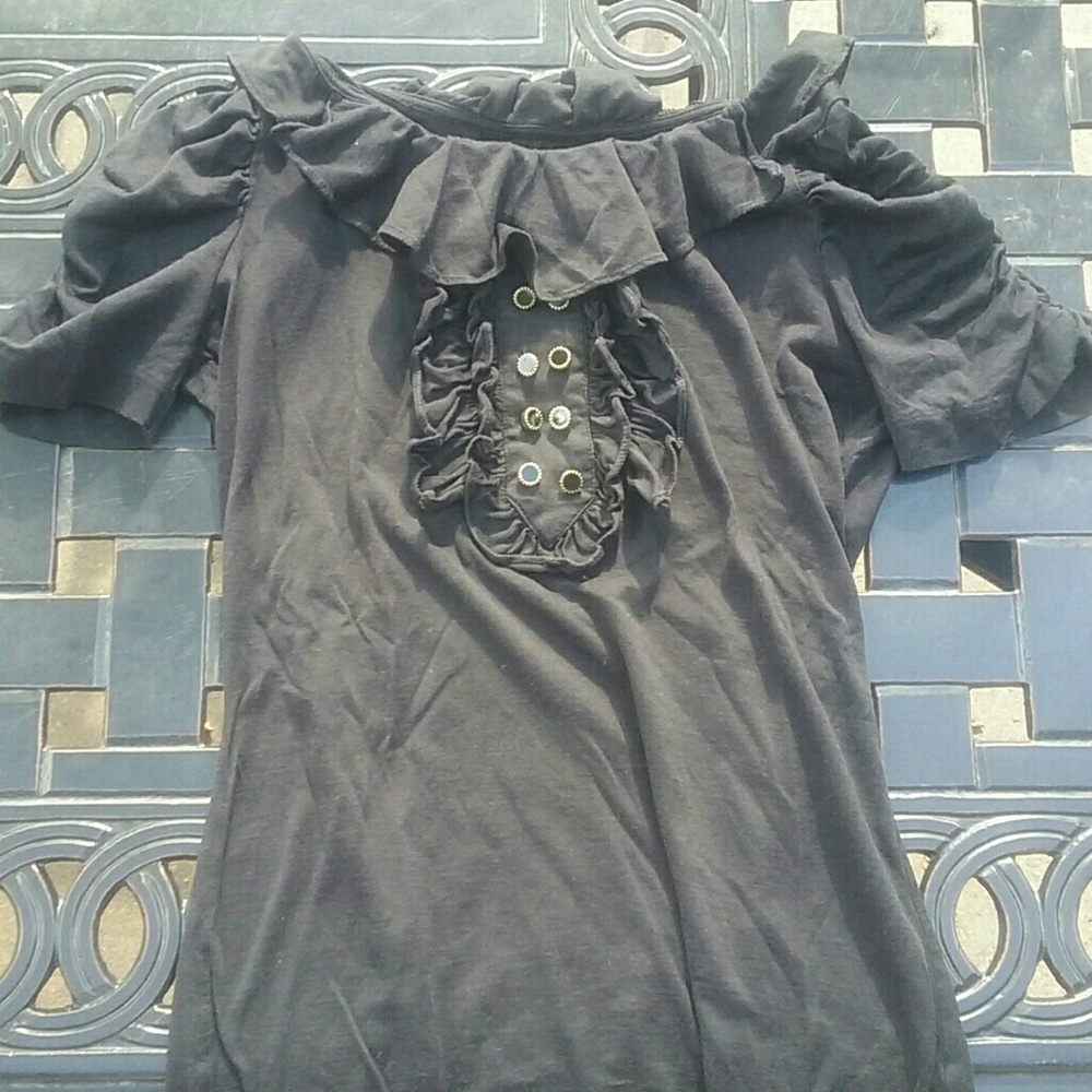 Black ruffled top with black and gold buttons